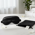 100% mulberry silk sleep mask 22 momme with silk storage pouch on marble surface